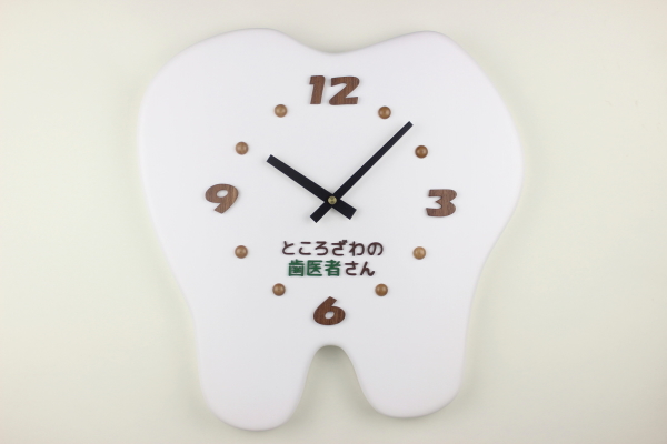 歯科医院様への開院祝い：歯の形の時計