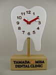 歯科医院様への開院祝いの「歯の形の置き時計006」の詳細ページへ