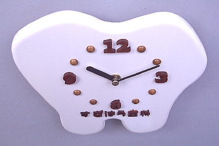 「すぎはら歯科」様への開院祝いの歯の形の時計